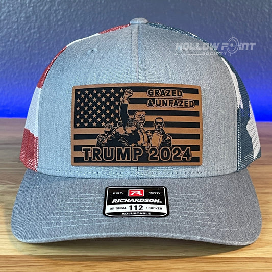 Trump Hat GRAZED & UNFAZED Flag Leather Patch SnapBack Trucker Hat Stars & Stripes - Hollow Point Society - Patch Hat