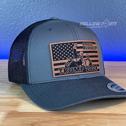 Grazed & Unfazed Trump 2024 SnapBack Trucker Rawhide Leather Flag Patch Charcoal Hat - Hollow Point Society - Patch Hat