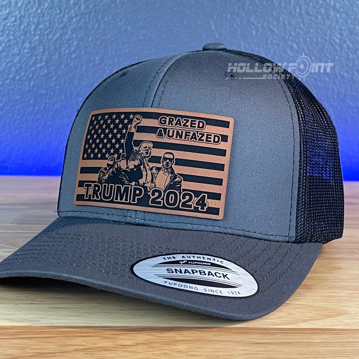 Grazed & Unfazed Trump 2024 SnapBack Trucker Rawhide Leather Flag Patch Charcoal Hat - Hollow Point Society - Patch Hat