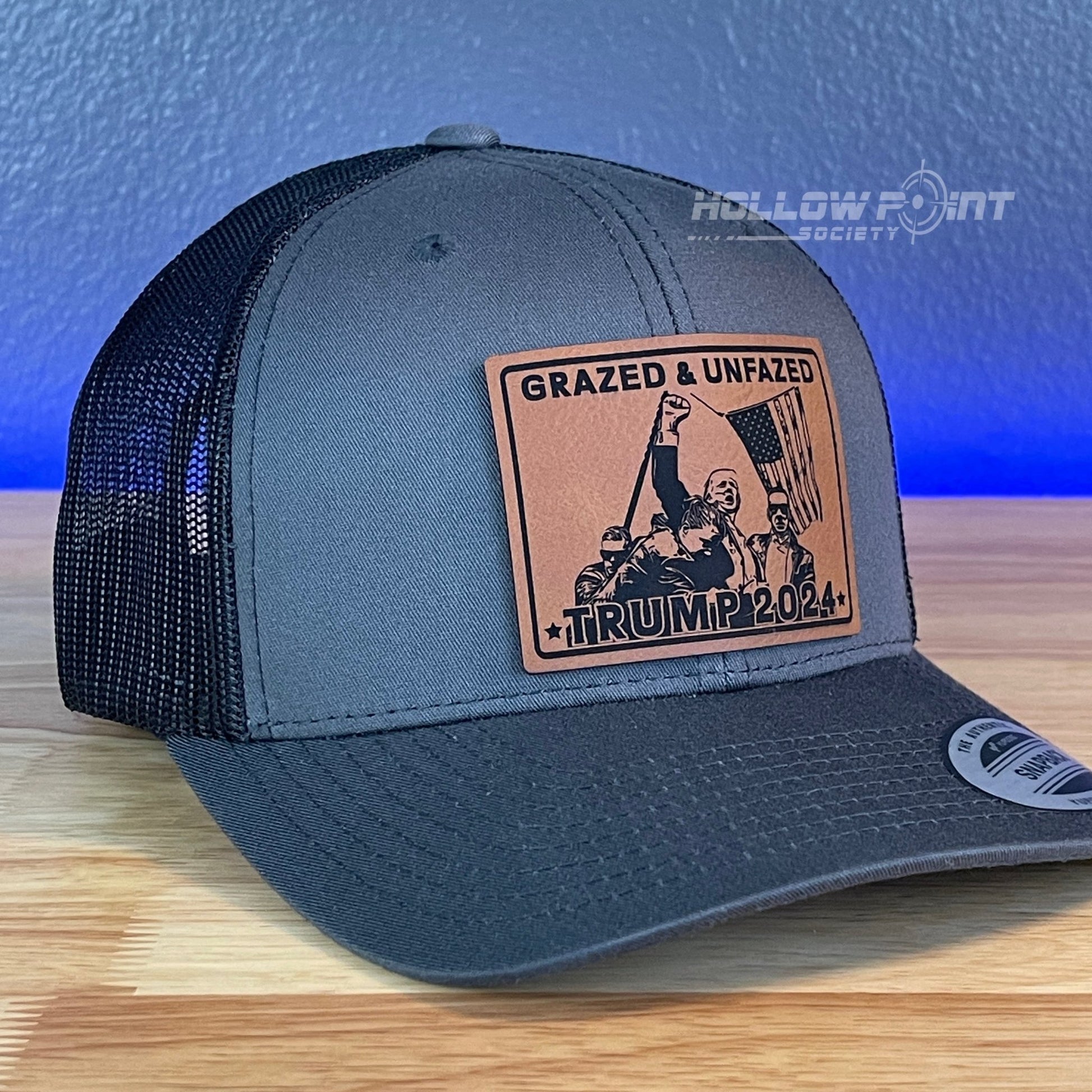 Grazed & Unfazed Trump 2024 SnapBack Trucker Rawhide Leather Patch Charcoal Hat - Hollow Point Society - Patch Hat