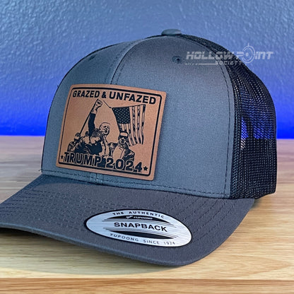 Grazed & Unfazed Trump 2024 SnapBack Trucker Rawhide Leather Patch Charcoal Hat - Hollow Point Society - Patch Hat