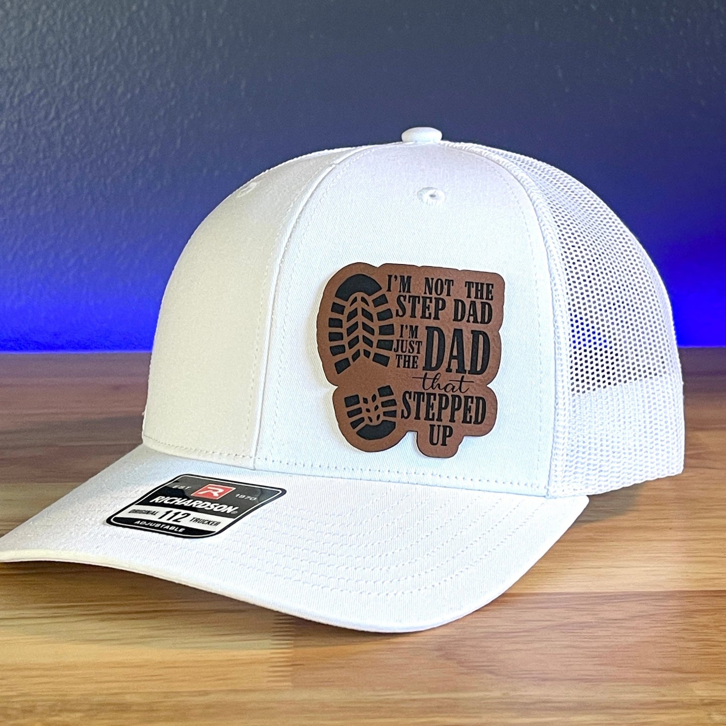 I'M NOT THE STEP DAD, I'M THE DAD THAT STEPPED UP Leather Patch Trucker Hat White - Hollow Point Society - Patch Hat