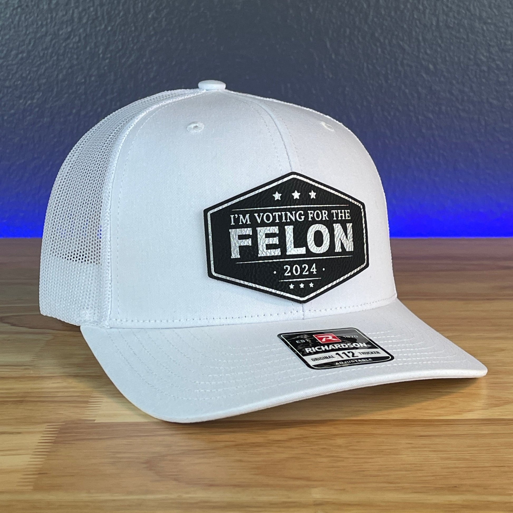 I'M VOTING FOR THE FELON Trump 2024 Leather Patch SnapBack Trucker Hat Black/Silver - Hollow Point Society - Patch Hat