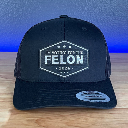 I'M VOTING FOR THE FELON Trump 2024 Leather Patch SnapBack Trucker Hat Black/Silver - Hollow Point Society - Patch Hat