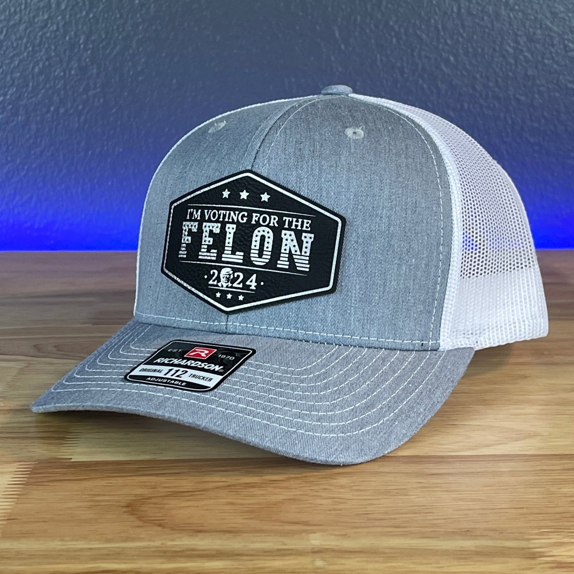 I'M VOTING FOR THE FELON Trump Face 2024 Leather Patch SnapBack Trucker Hat Black/Silver - Hollow Point Society - Patch Hat