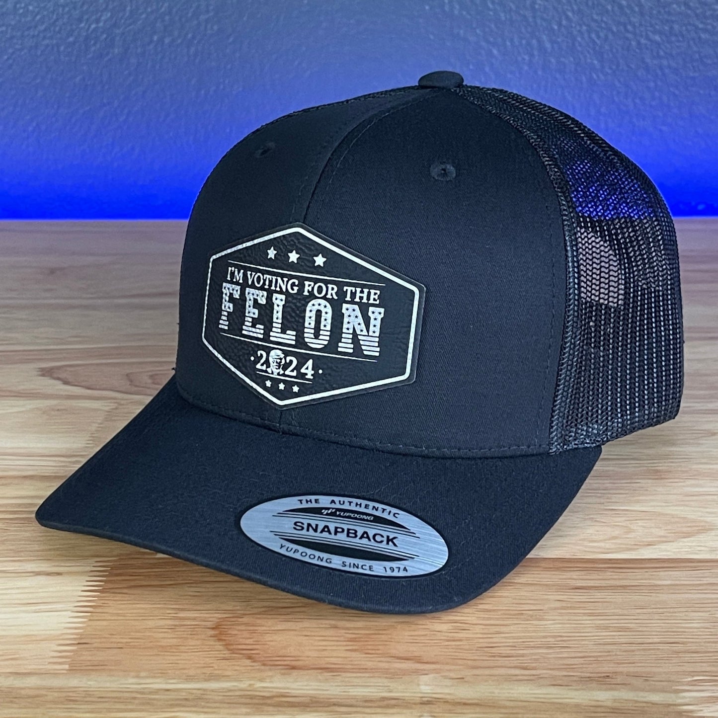 I'M VOTING FOR THE FELON Trump Face 2024 Leather Patch SnapBack Trucker Hat Black/Silver - Hollow Point Society - Patch Hat