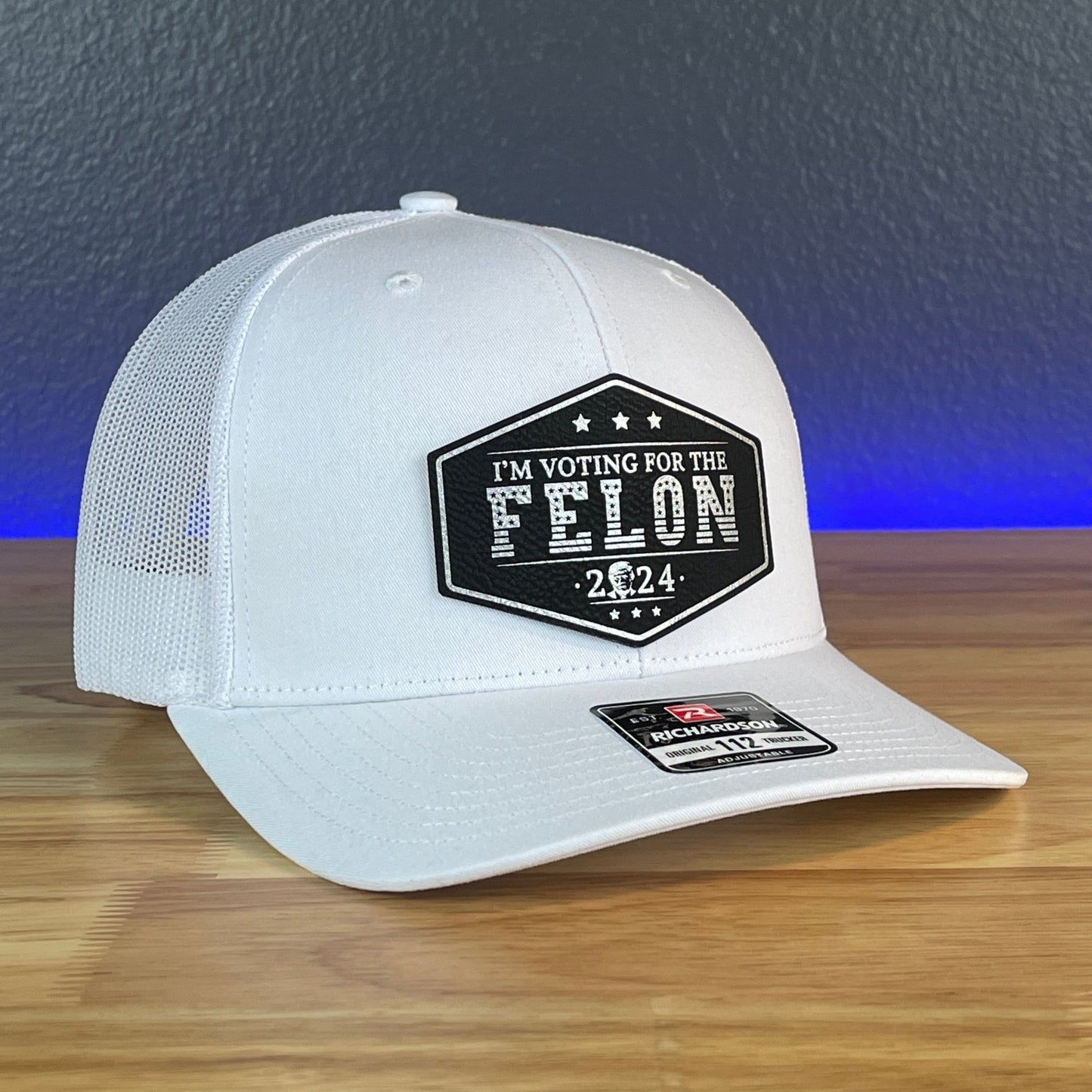 I'M VOTING FOR THE FELON Trump Face 2024 Leather Patch SnapBack Trucker Hat Black/Silver - Hollow Point Society - Patch Hat