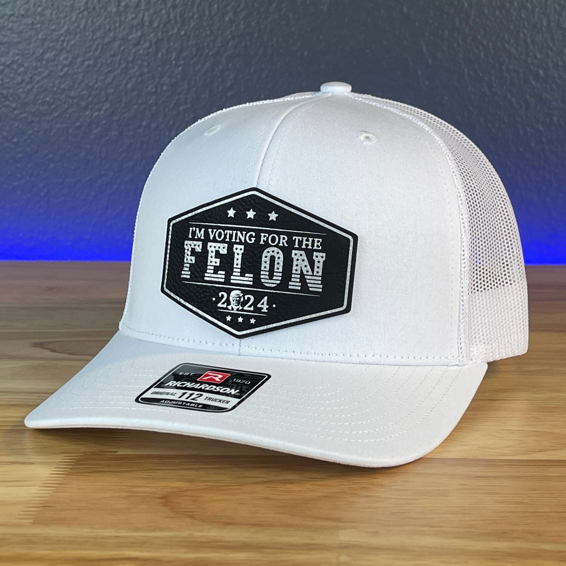 I'M VOTING FOR THE FELON Trump Face 2024 Leather Patch SnapBack Trucker Hat Black/Silver - Hollow Point Society - Patch Hat