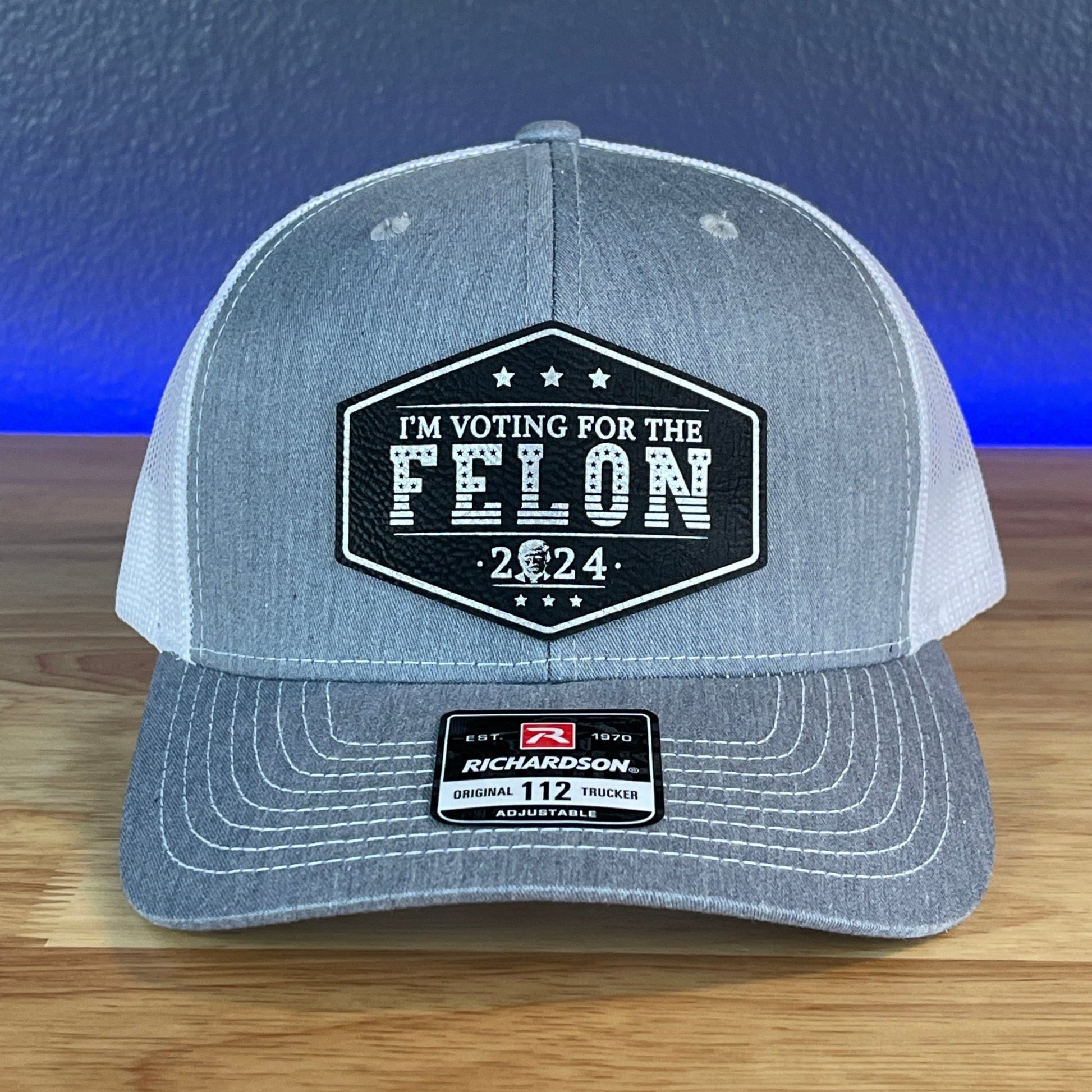 I'M VOTING FOR THE FELON Trump Face 2024 Leather Patch SnapBack Trucker Hat Black/Silver - Hollow Point Society - Patch Hat