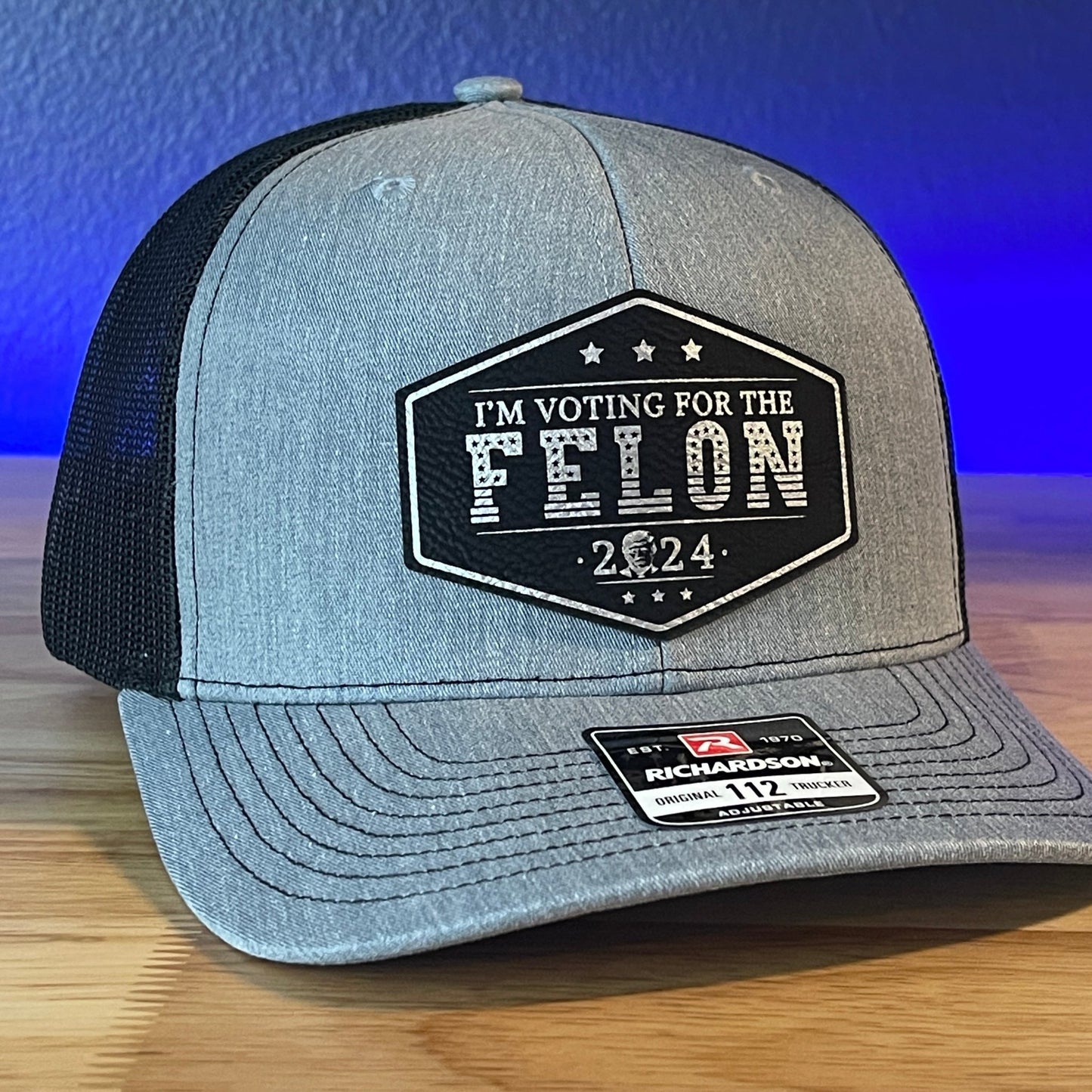 I'm Voting For The FELON Trump Face 2024 Trucker Hat Leather Patch Hat Black/Silver - Hollow Point Society - Patch Hat