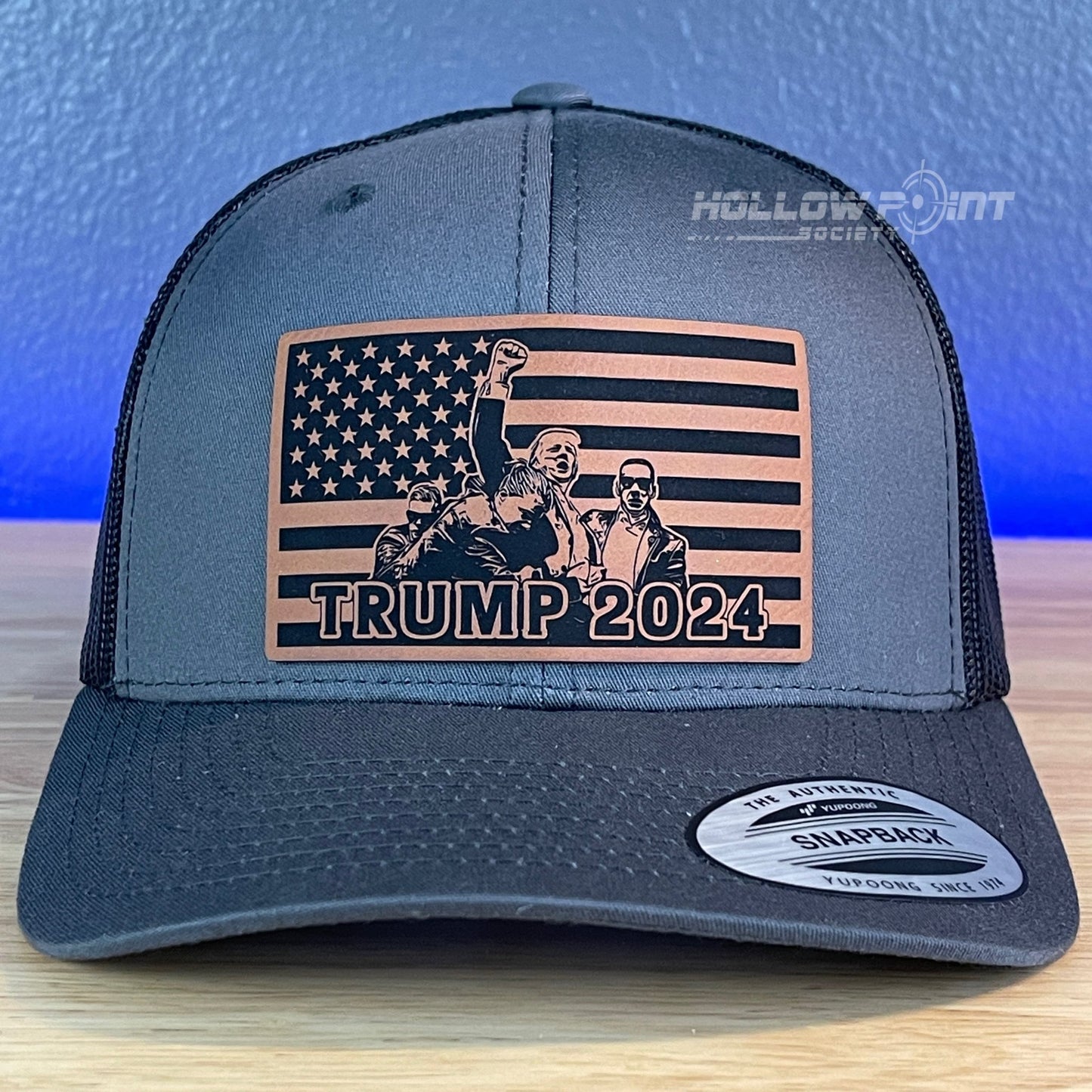 Trump 2024 American Flag SnapBack Trucker Rawhide Leather Patch Charcoal Hat - Hollow Point Society - Patch Hat