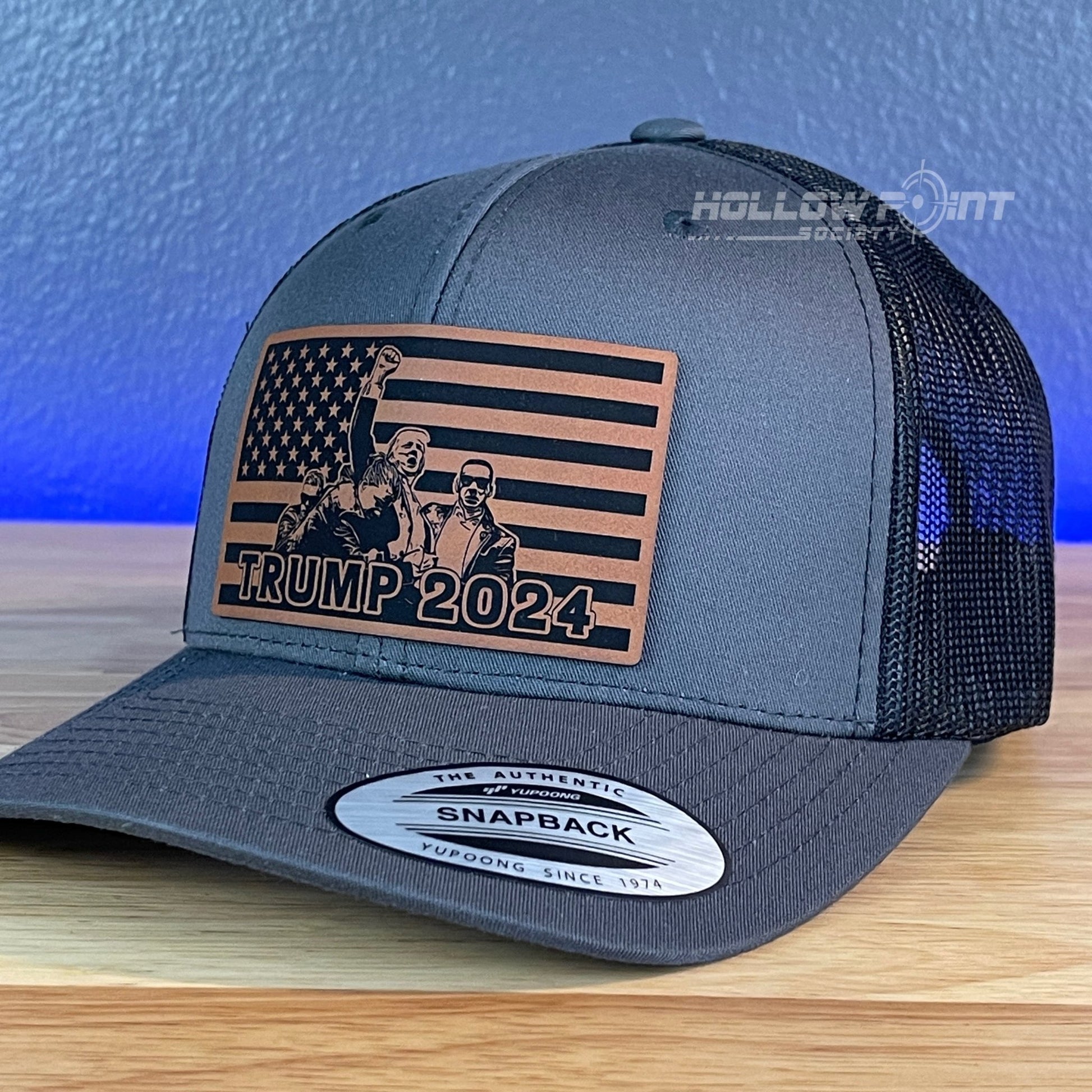 Trump 2024 American Flag SnapBack Trucker Rawhide Leather Patch Charcoal Hat - Hollow Point Society - Patch Hat