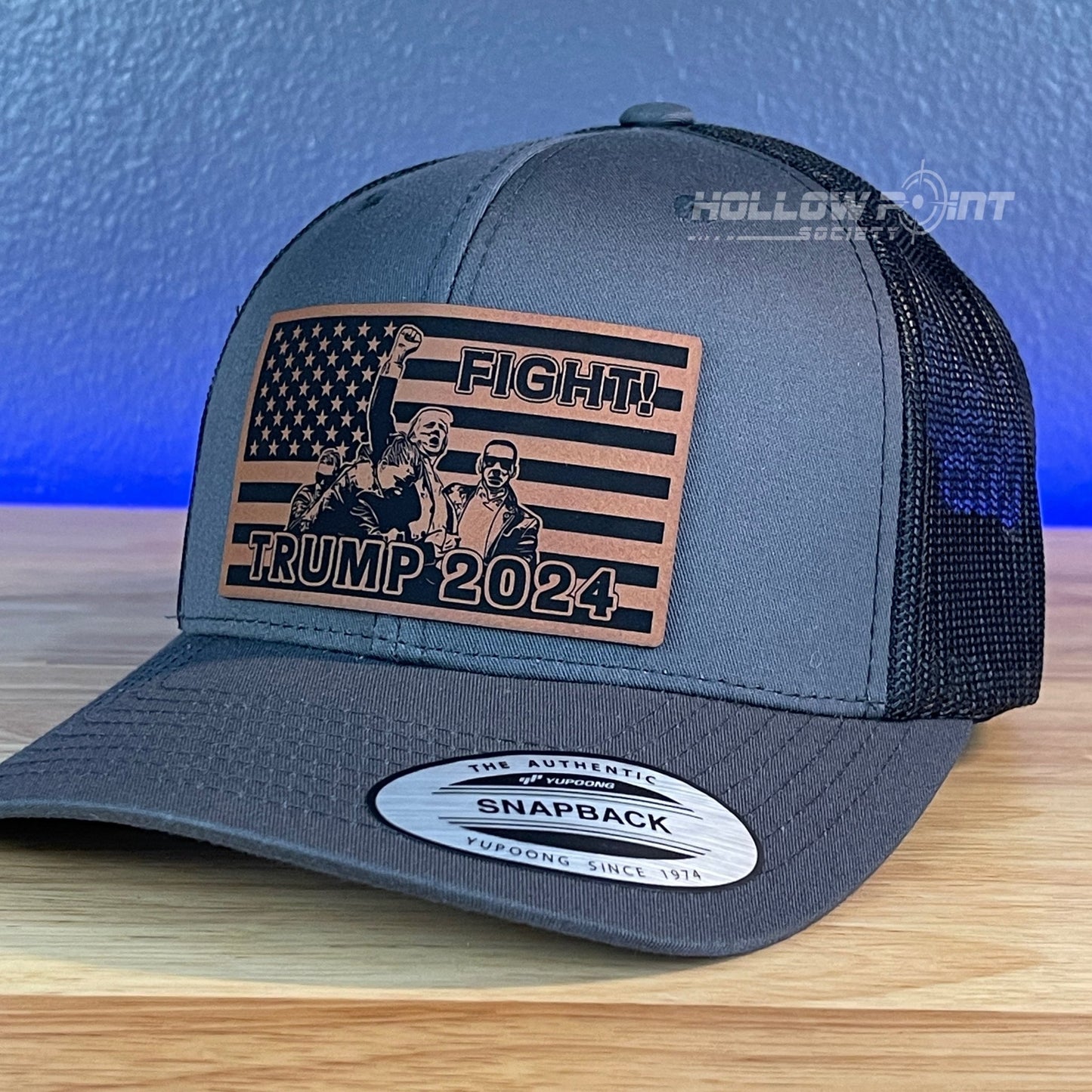 Trump 2024 SnapBack Trucker Rawhide Leather Fight Flag Patch Charcoal Hat - Hollow Point Society - Patch Hat