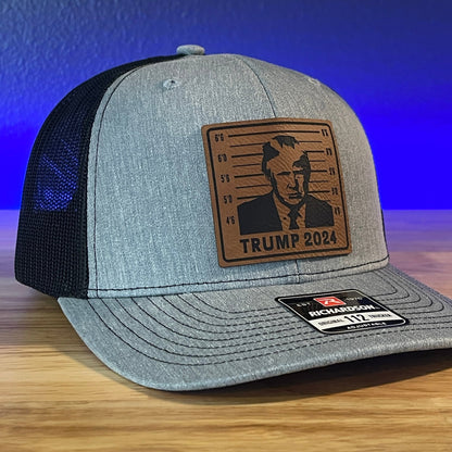 Trump Hat MUGSHOT 2024 Leather Patch Trucker SnapBack Hat - Hollow Point Society - Patch Hat