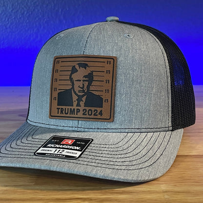 Trump Hat MUGSHOT 2024 Leather Patch Trucker SnapBack Hat - Hollow Point Society - Patch Hat