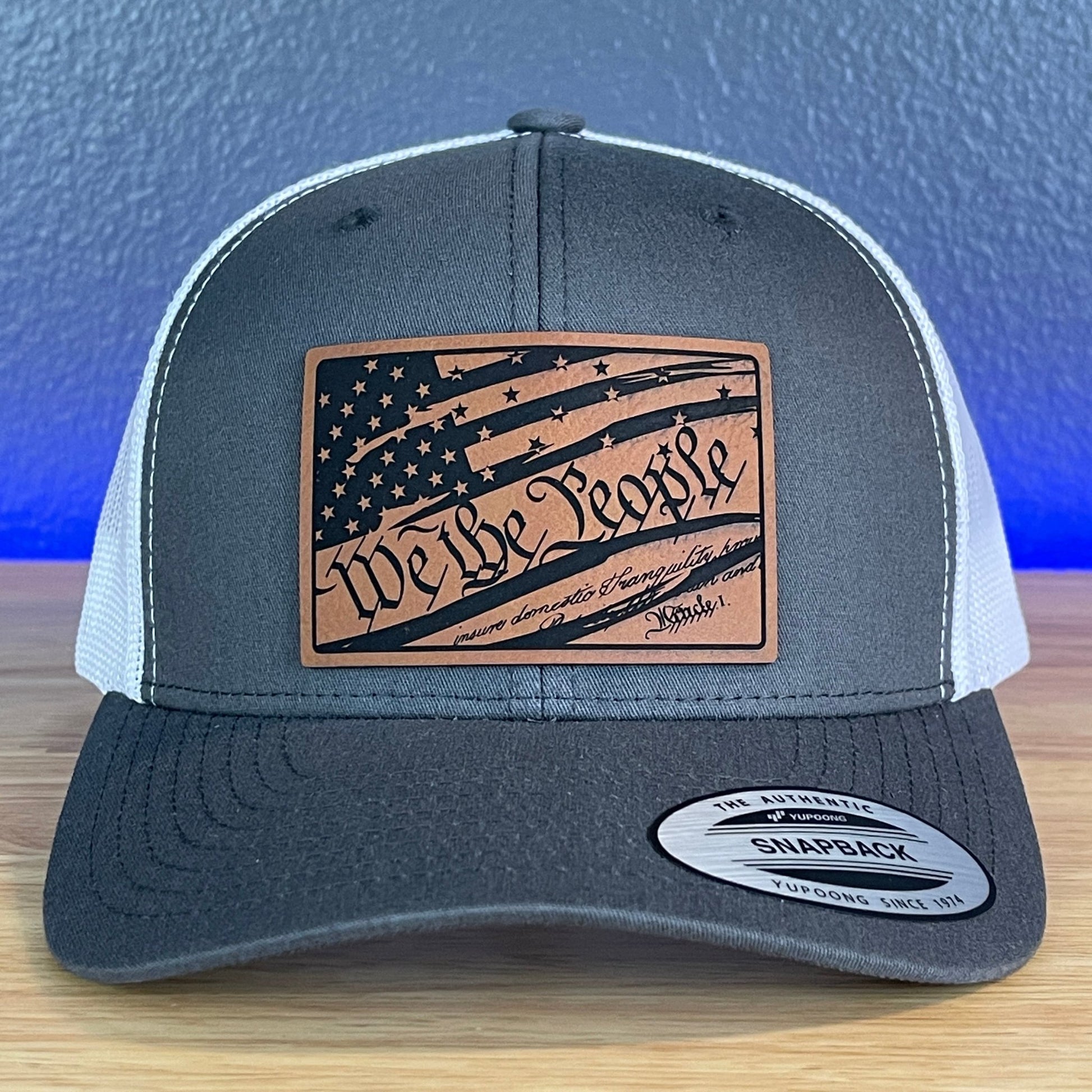 We The People American Flag Patriotic SnapBack Trucker Rawhide Leather Patch Hat Charcoal/White - Hollow Point Society - Patch Hat