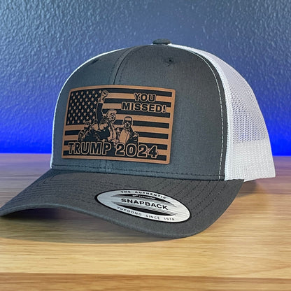 You Missed Trump 2024 Flag SnapBack Trucker Rawhide Leather Patch Hat Charcoal/White - Hollow Point Society - Patch Hat